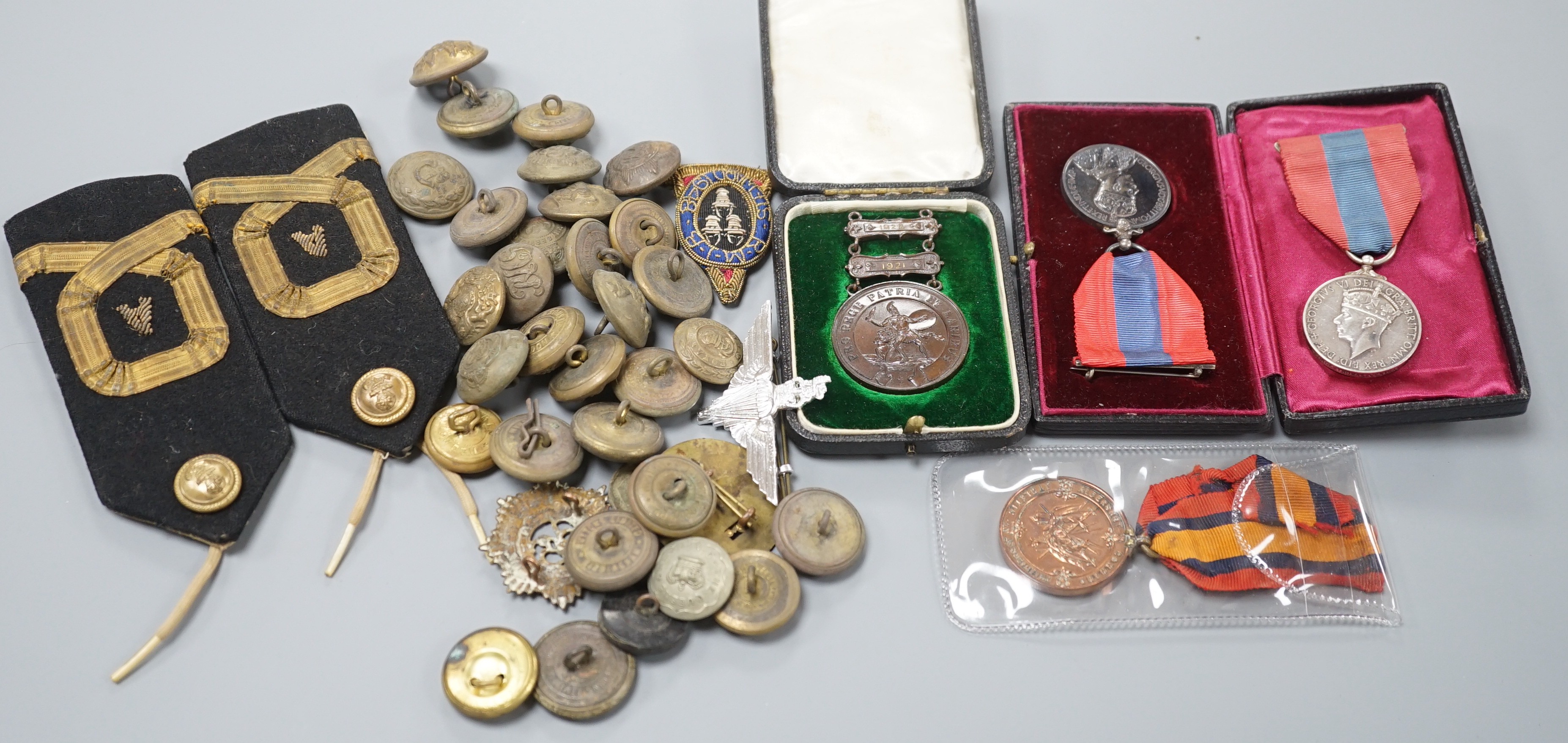 Military buttons and badges and miscellaneous medals